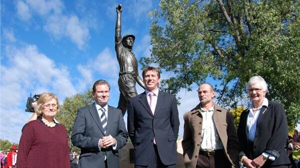 PROUD: Glenn McGrath (centre) at the unveiling of his statue in Narromine back in 2009. Photo: FILE
