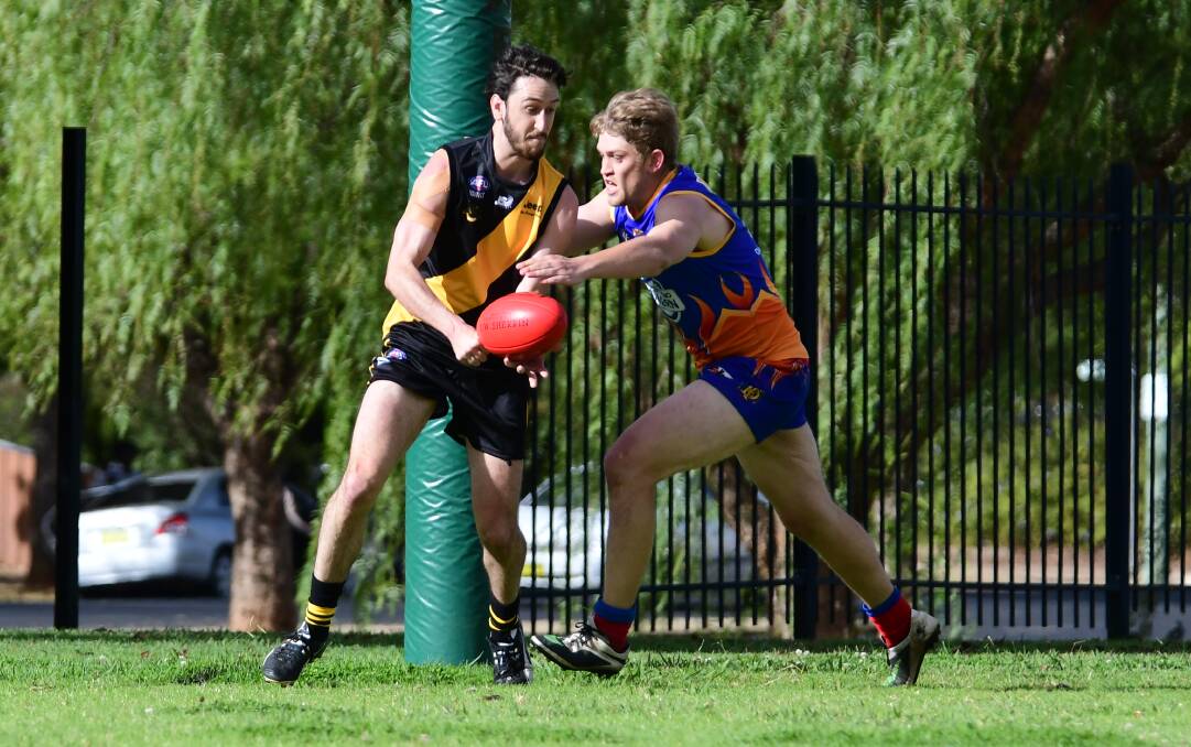 JOB TO DO: Bailey Delaney (right) returns for the Demons this weekend to renew acquaintances with Orange. Photo: BELINDA SOOLE