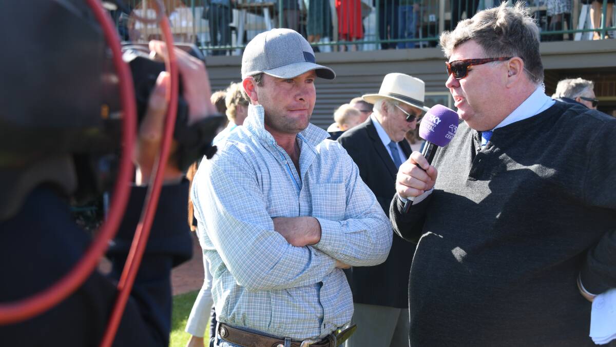 Trainer Brett Robb speaks with Sky Racing after winning Sunday's feature sprint with Dalavin. Picture by Amy McIntyre