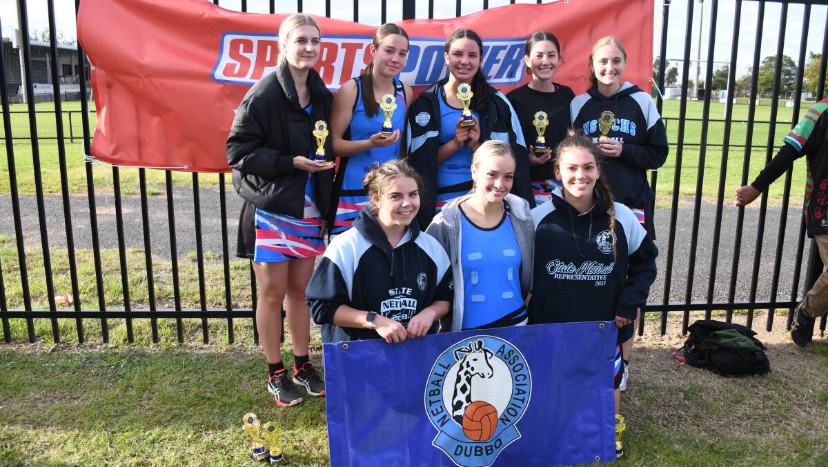 The Fusion Heat players with their runners-up trophies after Saturday's A Grade grand final loss. Picture by Amy McIntyre