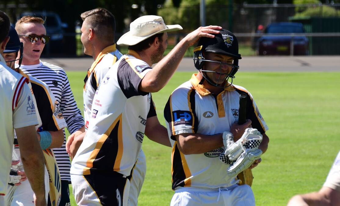GOT IT: Newtown captain Mat Skinner congratulates Wayne Dunlop after the pening batsman guided his side to victory. Photo: AMY McINTYRE
