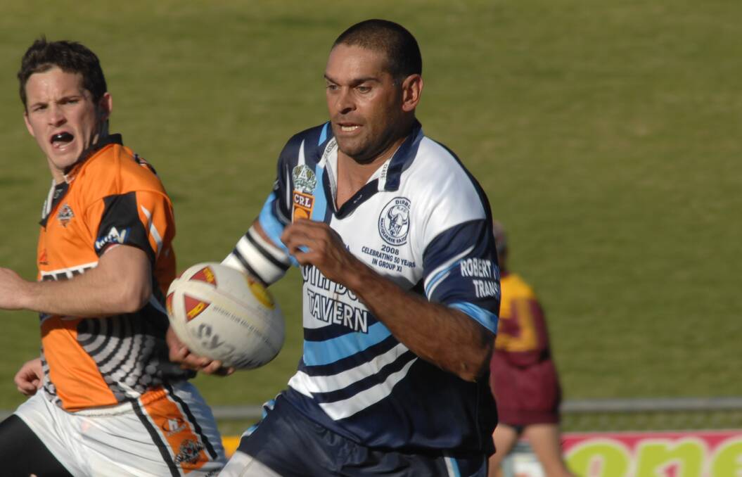 BACK AGAIN: David Peachey, pictured playing for Macquarie in 2008, will coach the club's under 18s next season. Photo: FILE