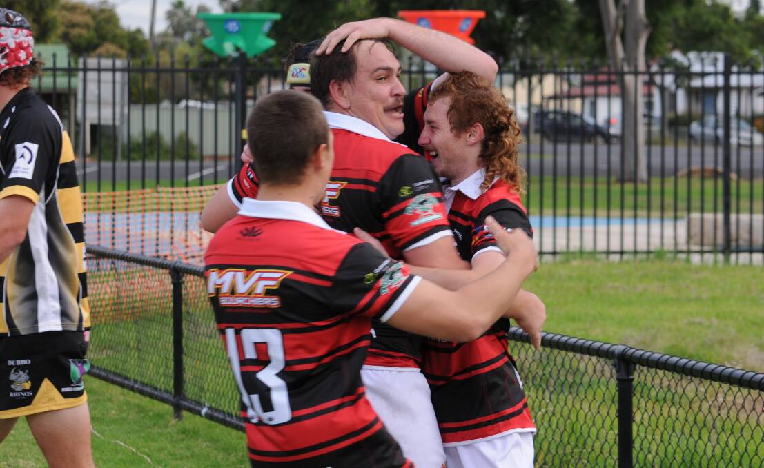 POSITIVE: The Narromine Gorillas celebrate after scoring a try on Saturday during Saturday's meeting with the Rhinos. Picture: Nick Guthrie