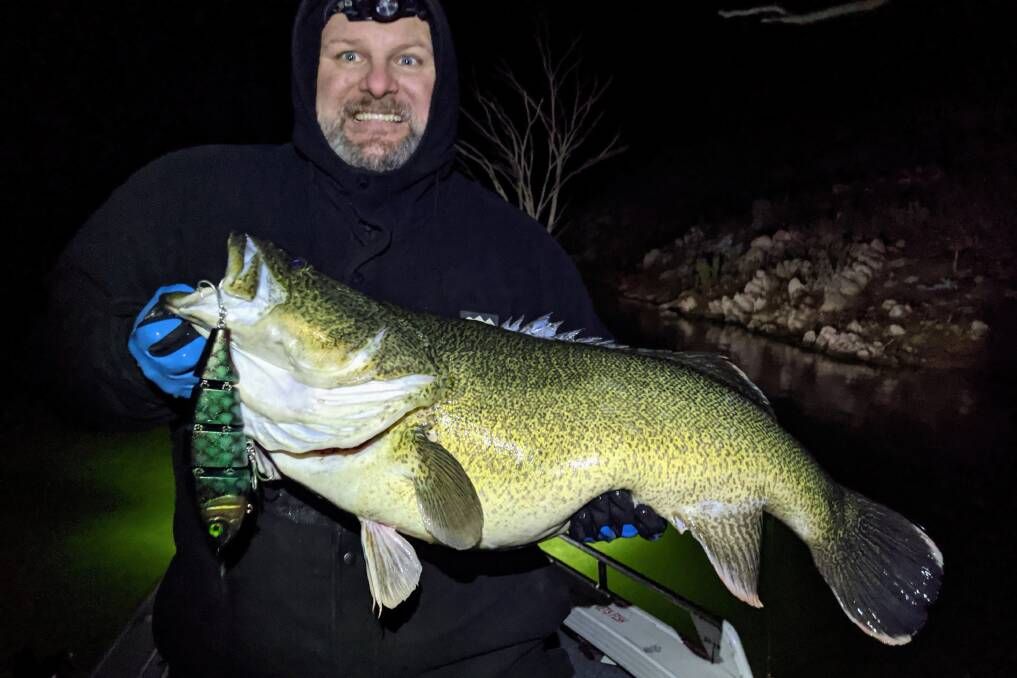 GOT IT: Jamie Judd with a Murray cod caught on a GobSmacked handcrafted swimbait. Photo: CONTRIBUTED