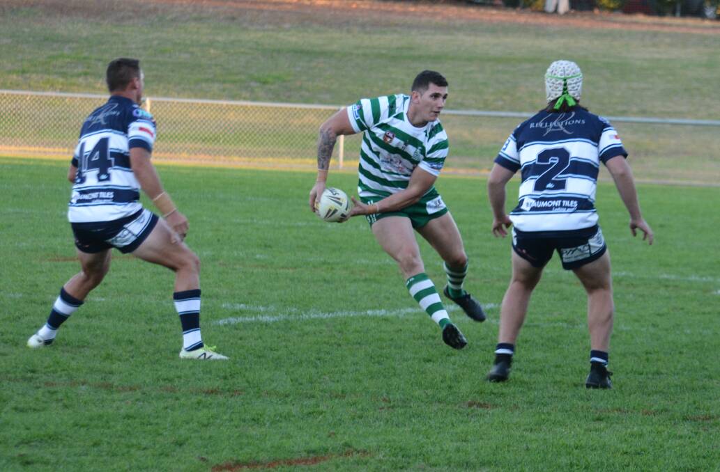TAKE THEM ON: CYMS' Corey Cox in action against Macquarie last season. The two clubs would feature in the same pool in a new competition proposal. Photo: NICK GUTHRIE
