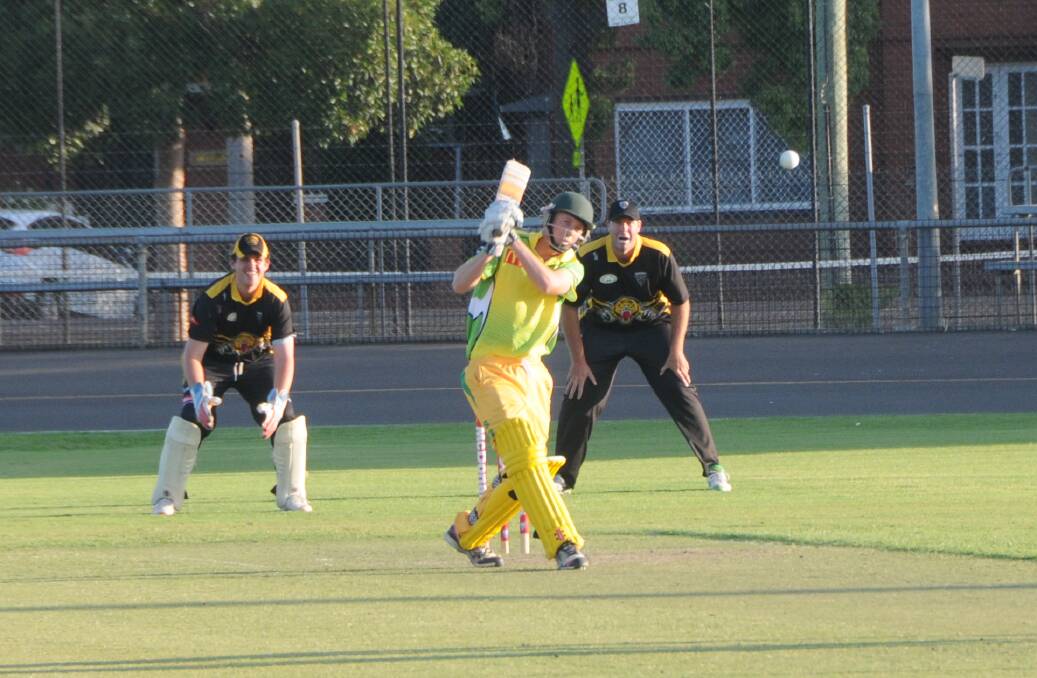 WHACK: Castlereagh Hornets' Mat Final hits out during lats season's Megahit grand final against the Amaroo Hotel Tigers. Photo: NICK GUTHRIE