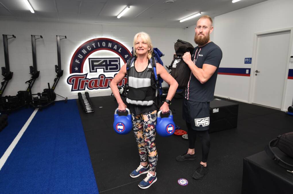 HELPING HAND: Melanie Currey with F45 owner and trainer Jed Hardiman prior to her taking part in the Oran Rely for Life. Photo: Belinda Soole. 