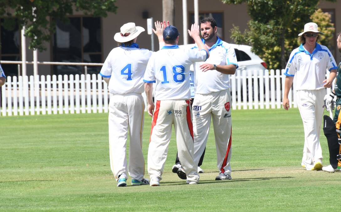 GOT HIM: Dubbo players celebrate a wicket during Sunday's Western Zone Plate clash with Bathurst. Picture: Amy McIntyre