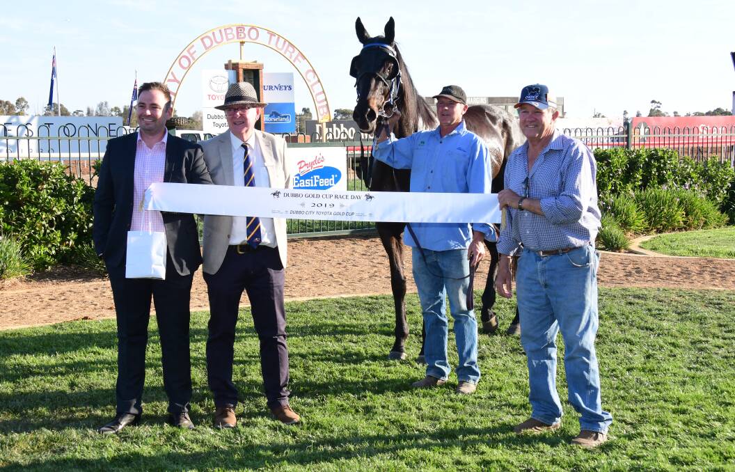 SUCCESS: Michael Mulholland and Steamin' (centre) after the Dubbo Gold Cup win earlier in the month. Photo: AMY McINTYRE