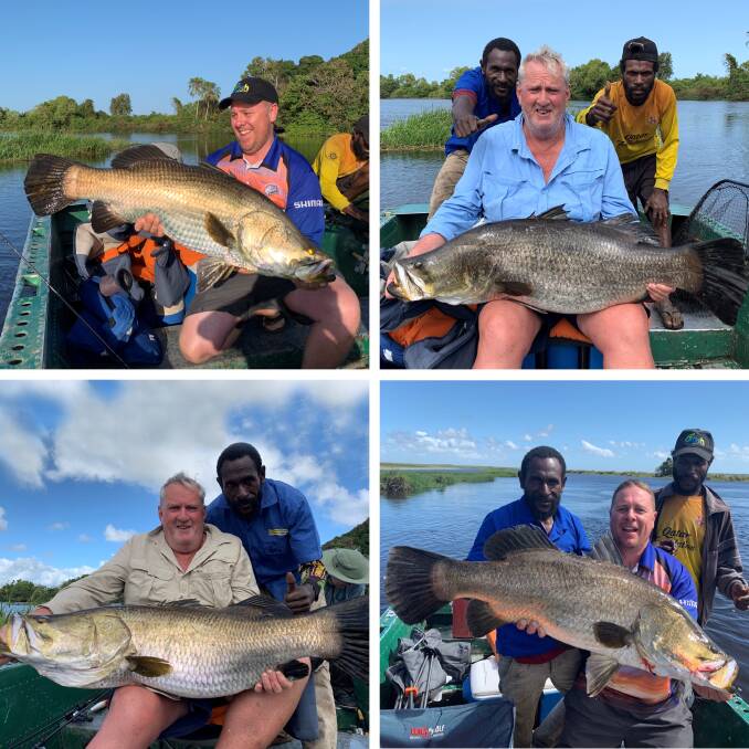 David Easman and Matt Hansen with some metre-plus Barramundi caught on their recent fishing trip to Papua New Guinea. 