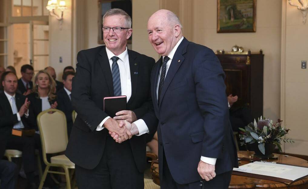 Newly appointed minister for regional services, decentralisation and local government Mark Coulton being sworn in to the federal ministry by Australian Governor-General Sir Peter Cosgrove in Canberra.