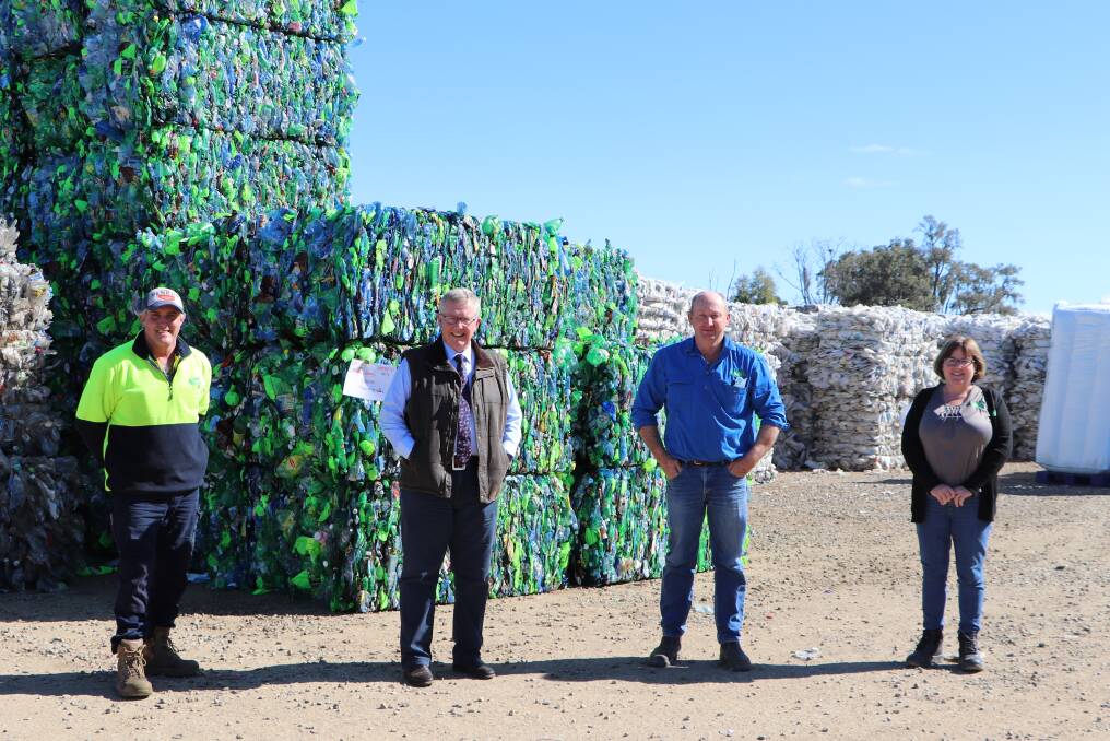 Federal Member for Parkes Mark Coulton (second from left) recently visited Narrabris Australian Recycled Plastics facility to announce the funding for its reprocessing capacity expansion. He is pictured with operations manager Terrence Duncan, co-owner Dale Smith and office manager Jennifer Grant.