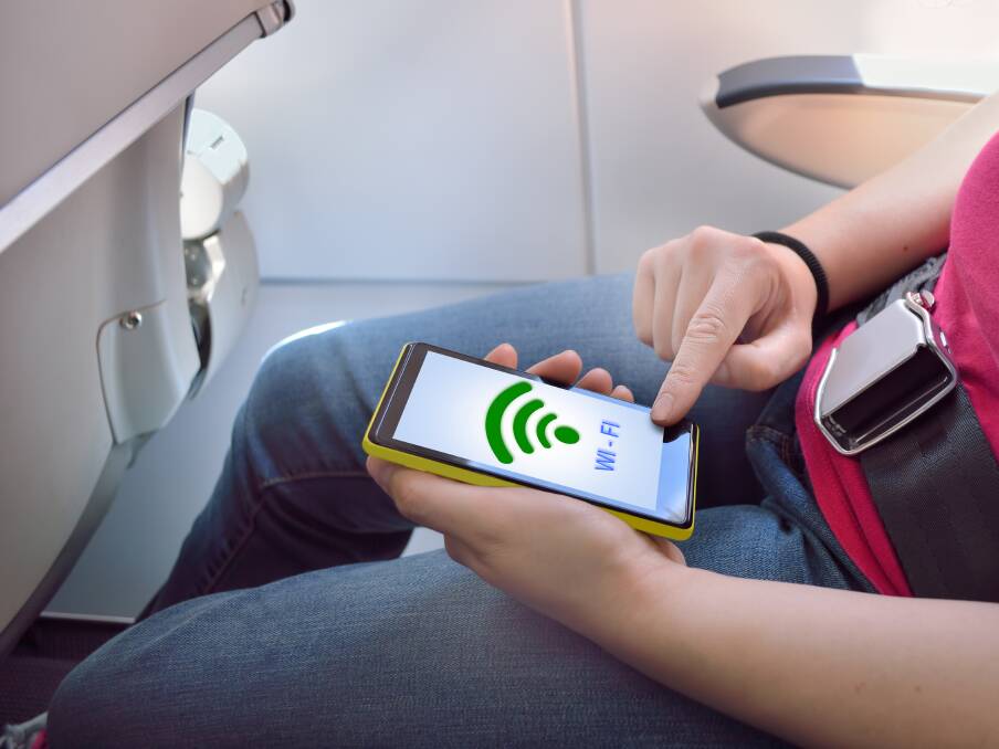 CONNECTING ON FLIGHTS: Qantas is trialling free Wi-Fi on some of its planes and Virgin Australia is set to follow soon.