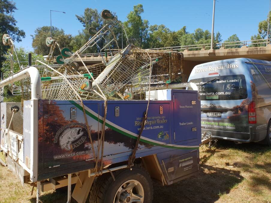 The Inland Waterway’s River Repair Bus with some of the trolleys pulled from the river in the Dubbo CBD.