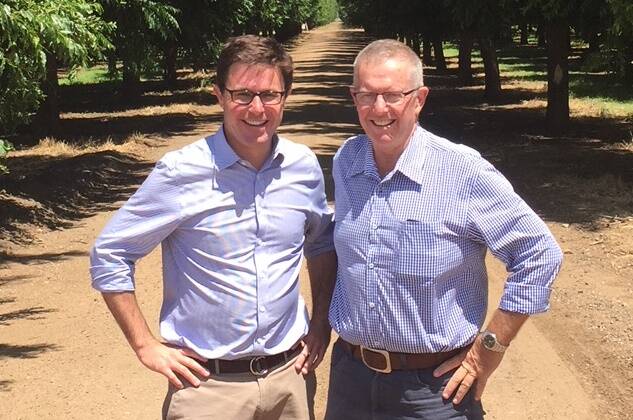 Minister for Agriculture and Water David Littleproud, with Mark Coulton Member for the Parkes electorate near the cenotaph at Dubbo.