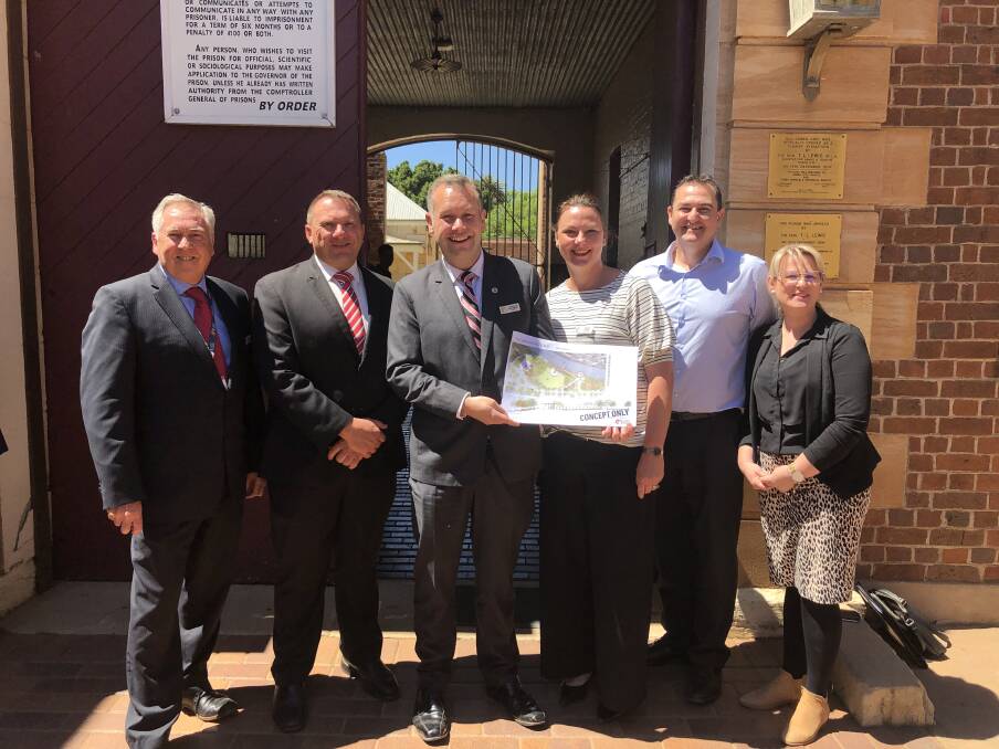 Dubbo Regional Council CEO Michael McMahon, Council Greg Mohr, Mayor Ben Shields, Director Culture and Economy Natasha Comber, Manager Regional Experiences Jamie Angus and Manager Economic Development and Marketing Josie Howard with the concepts for three exciting developments.
