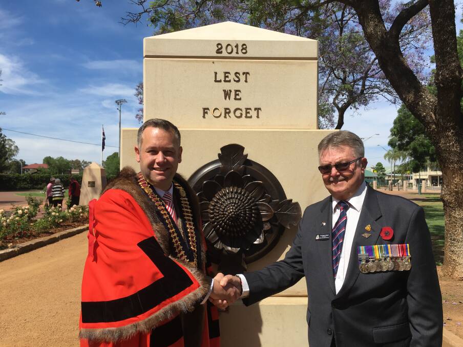 Mayor of the Dubbo Region Ben Shields and Dubbo RSL Sub-Branch president Tom Gray in front of one of the new Centenary of Armistice memorial plinths.