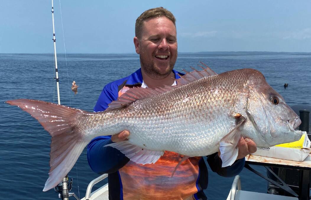 Matt Hansen with a snapper caught and released over the Christmas period. 