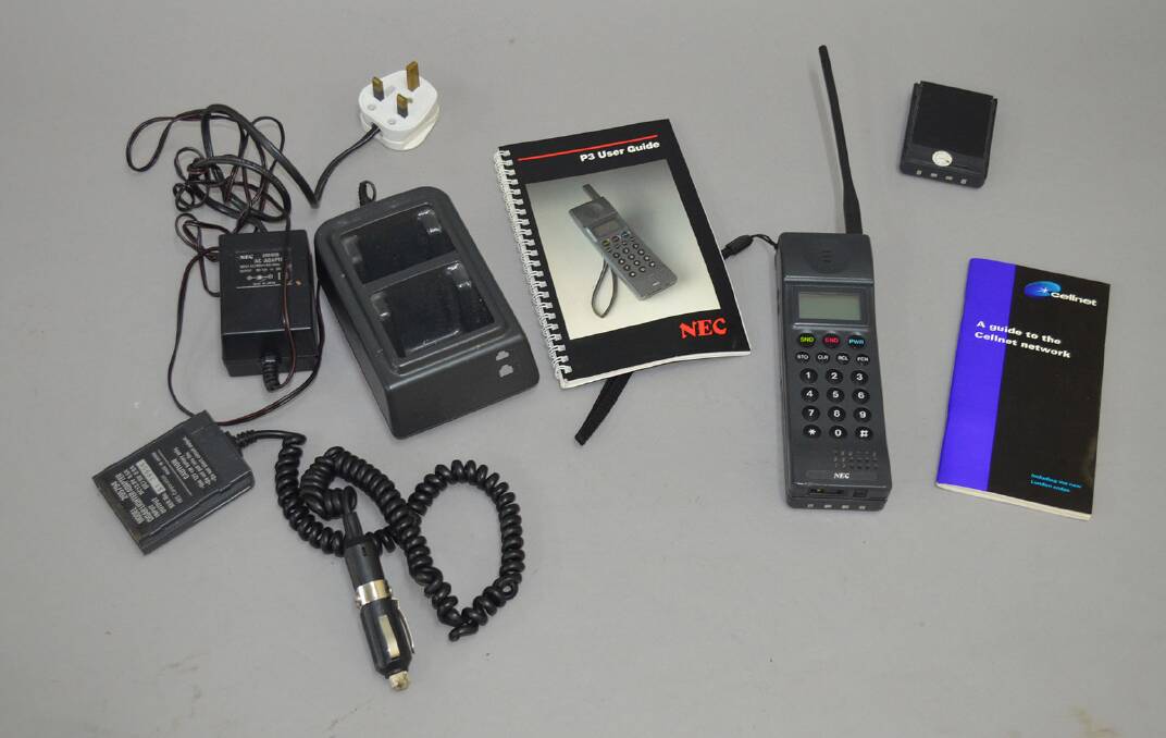 Mobile evolution: The NEC P3 (pictured) and the Motorola 8000 ‘brick phone’ were very popular in the early 90s.