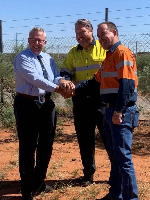 Mark Coulton with Fluence general manager Australia Aaron McCann and AGL head of gas and renewables Kevin Taylor in Broken Hill.