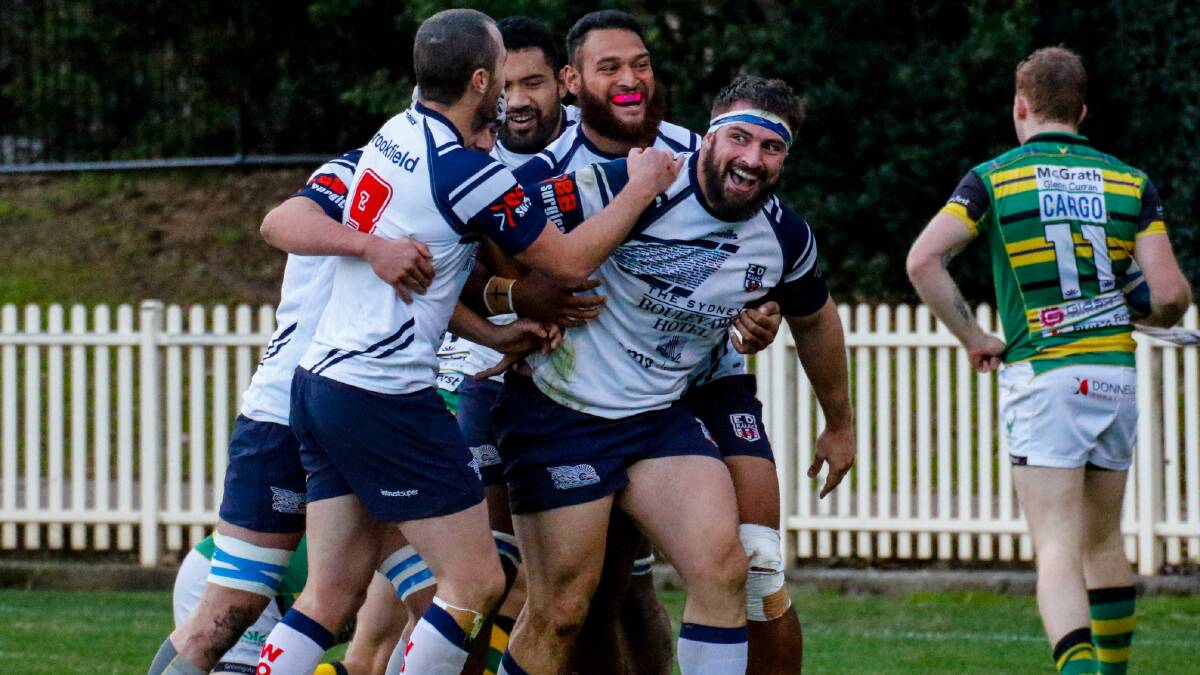 Eastwood prop Dean Doumbos goes in during a 71-17 NSW Intrust Super Shute Shield win over Gordon at Chatswood Oval on Saturday. Photo: Serge Gonzalez