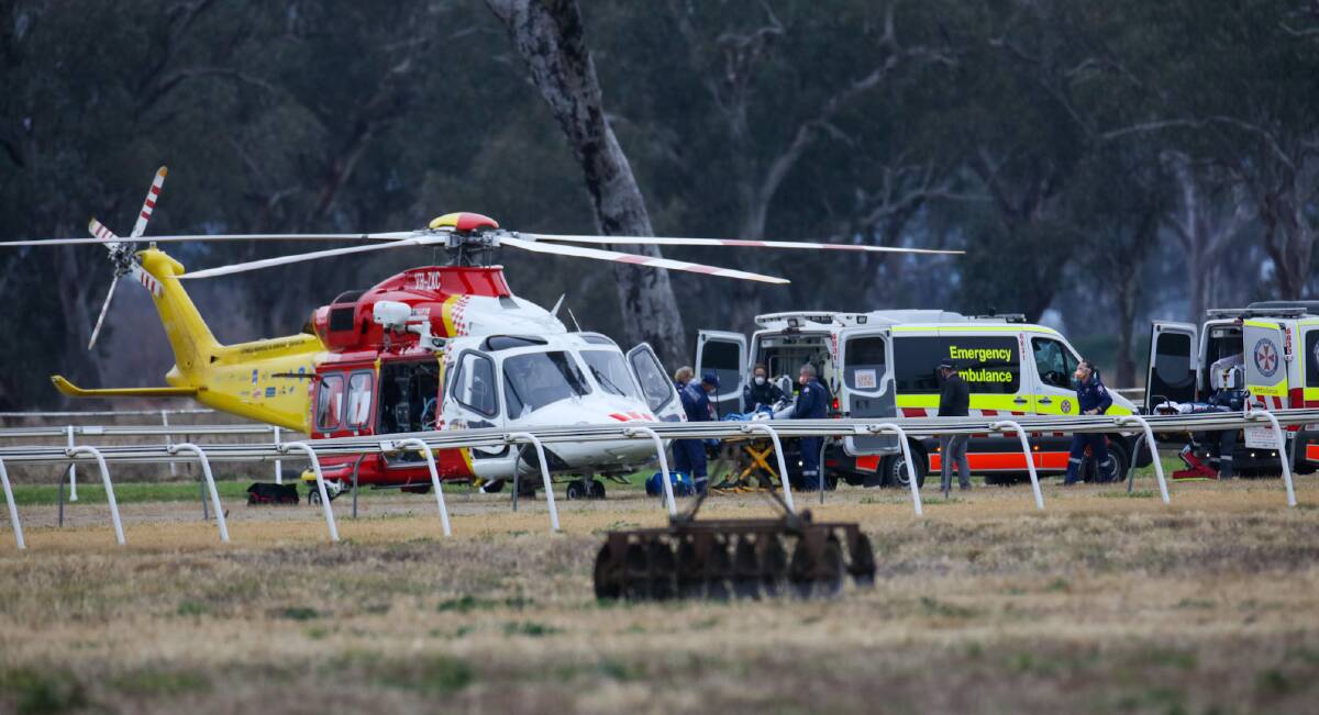 Injury: Elissa Meredith was treated by paramedics before being airlifted to hospital due to a head injury suffered during today's race meet in Gunnedah. Photo: Dockerty Photography.