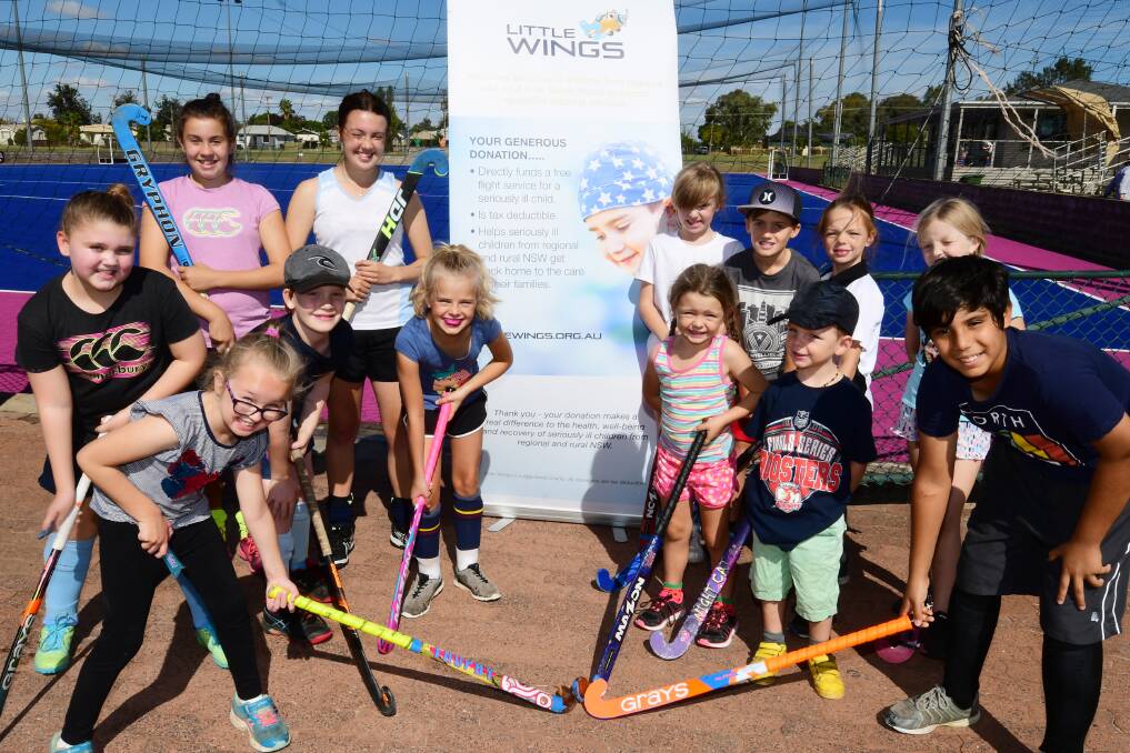 Getting involved: A host of new players got their first taste of hockey at the 'I Love Hockey' event at Dubbo on Saturday. Photo: BELINDA SOOLE