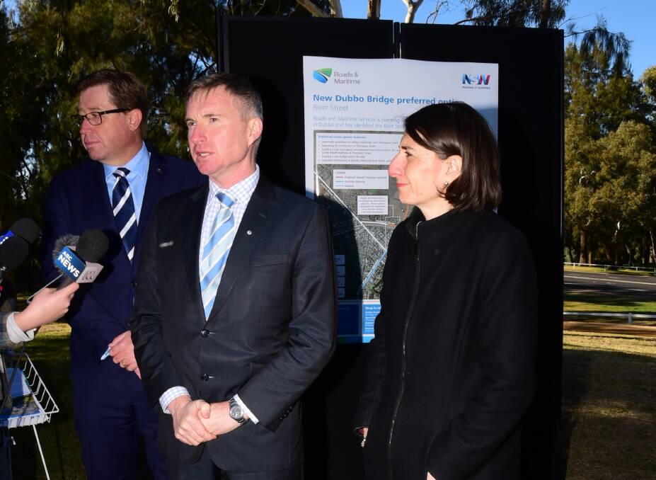 RMS executive director of regional freight services Roy Wakelin-King with Dubbo MP Troy Grant and NSW Premier Gladys Berejiklian at Friday's announcement. Photo: BELINDA SOOLE