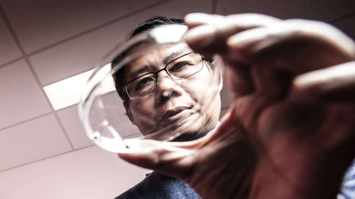 LANDMARK DISCOVERY: The UOW team led by Senior Professor Xiaolin Wang realised the non-contact manipulation of liquid metal. Picture: Paul Jones