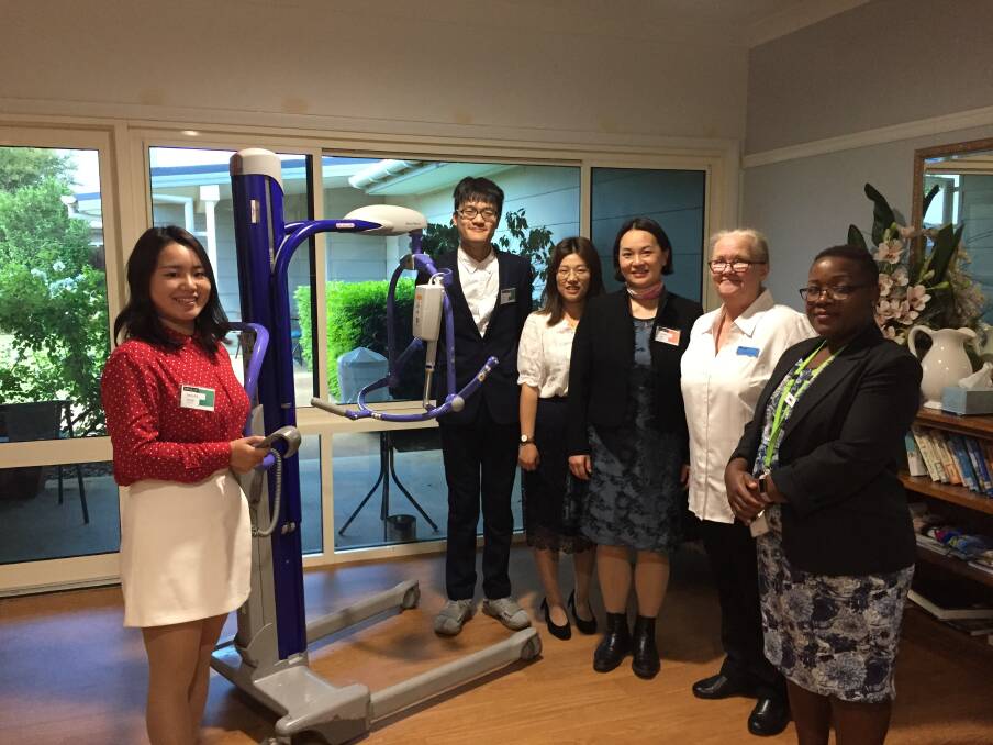 Exchange: (From left) Registered nurses 'Maggie' Wuminjie, 'SJ' Shi Jie, 'Julie' Zhu Li and 'Liliana' Yang Li learn about equipment used in Australia with TAFE NSW's Alannah Fraser and Holy Spirit Dubbo manager Annie Chida. 