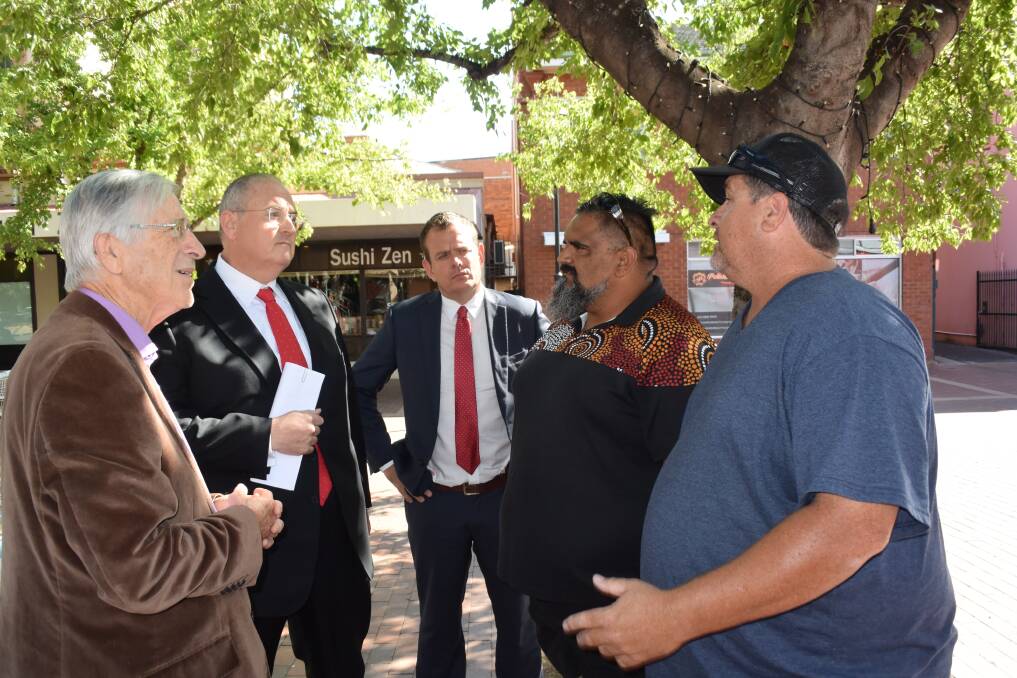 $20M PROMISE: Retired judge John Nicholson SC, opposition spokesman for health Walt Secord and Country Labor candidate for Dubbo Stephen Lawrence discuss the need for rehabilitation services with community members Joe Gordon and Jason Chatfield. Photo: FAYE WHEELER
