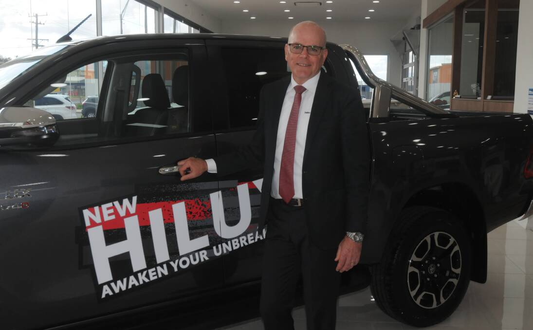 Back on track: Dubbo City Toyota dealer principal David Hayes with new stock in the showroom. Photo: FAYE WHEELER