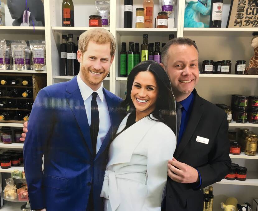 Dubbo Region mayor Ben Shields at the city's visitor centre, where a life-like photo board of the Duke and Duchess of Sussex has been installed ahead of the couple's visit. Photo contributed.