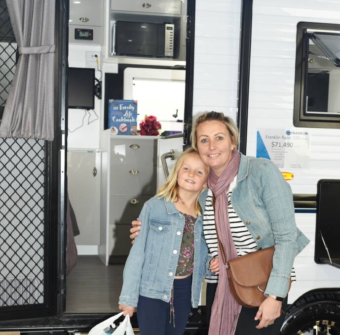 Family time: Bella and Nerida Burton of Dubbo look at options for future holidays at the Orana Caravan, Camping, 4WD and Fish Show. Photo: AMY MCINTYRE