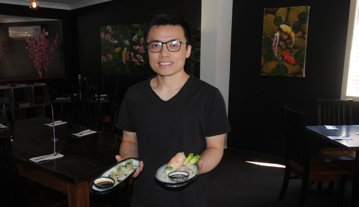 On the menu: The Vietnamese House owner and chef Leo Tran with dumplings and rice paper rolls made in-house daily, ready to welcome customers through the door. Photo: FAYE WHEELER