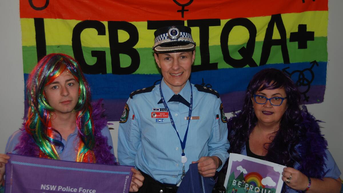 Be proud: headspace Dubbo's Nicolas Steepe and Rachel Thomas and NSW Police western region sponsor for sexual and gender diversity Inspector Gemini Bakos promote last year's Wear it Purple Day. Photo: GRACE RYAN