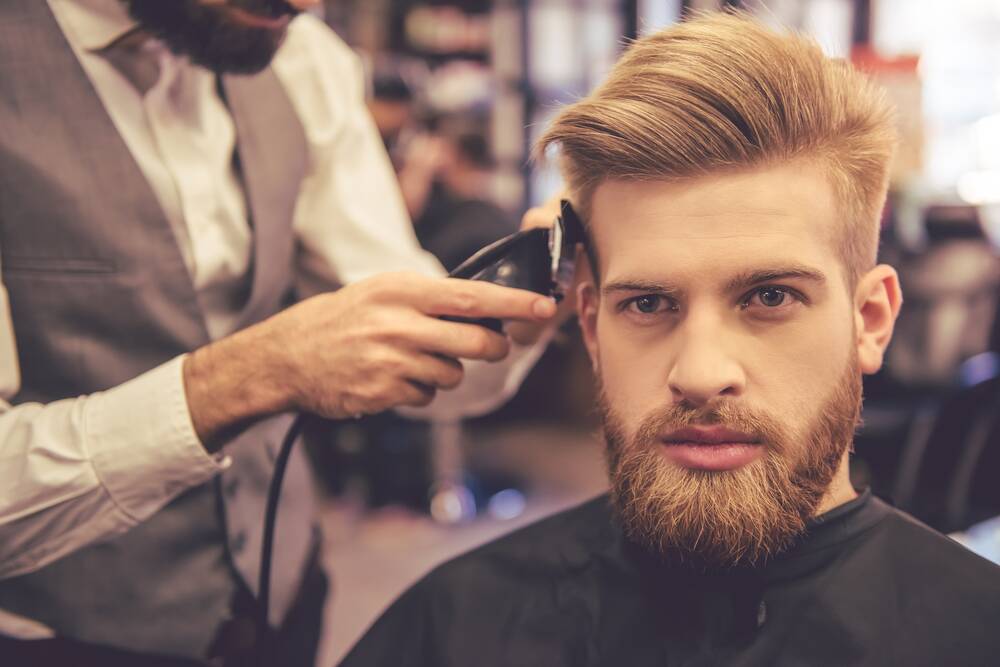 A tidy-up at the barber's will be possible for vaccinated people next month. Photo: SHUTTERSTOCK