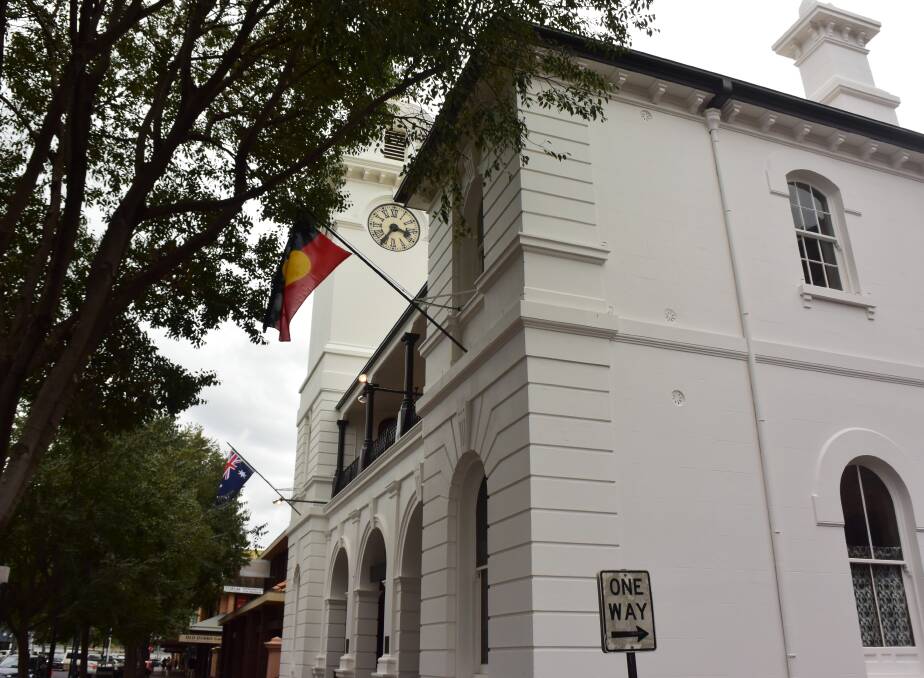 Heritage: The Australian and Aboriginal flags installed at The Exchange Clock Tower. 