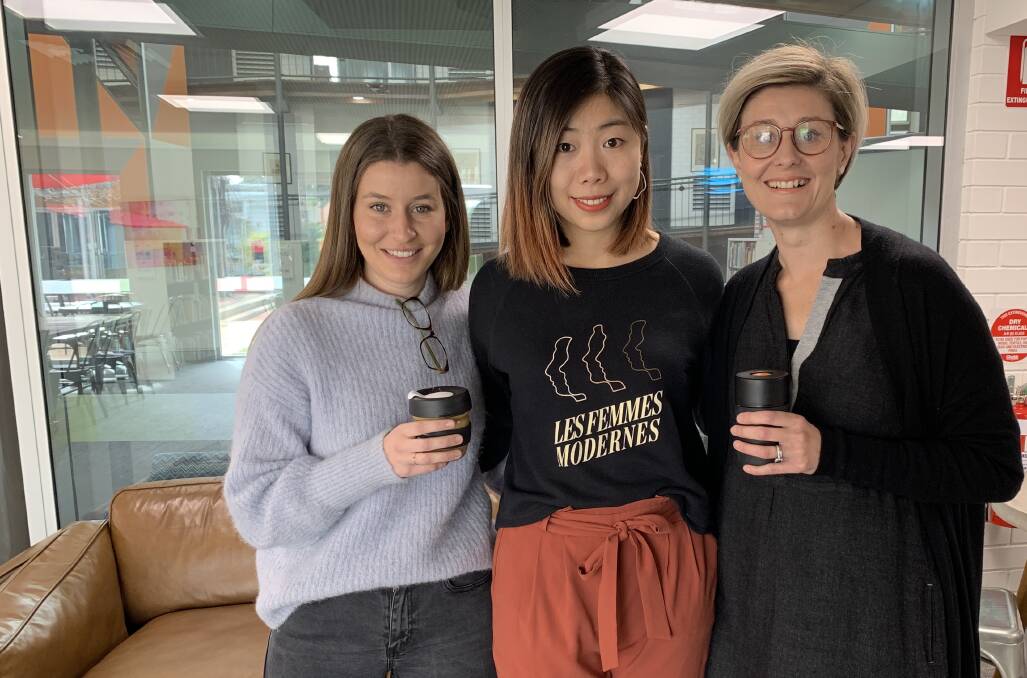 Sharing: The Exchange's Minna Demetriou and Kate Wade welcome (centre) Stanford Graduate School of Business student Bella You for a five-week stay. Photo contributed.
