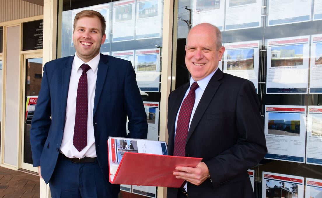 Andrew McDonald Commercial Dubbo real estate agents Joe Burgun and Andrew McDonald review listings in 2020. Picture: AMY MCINTYRE