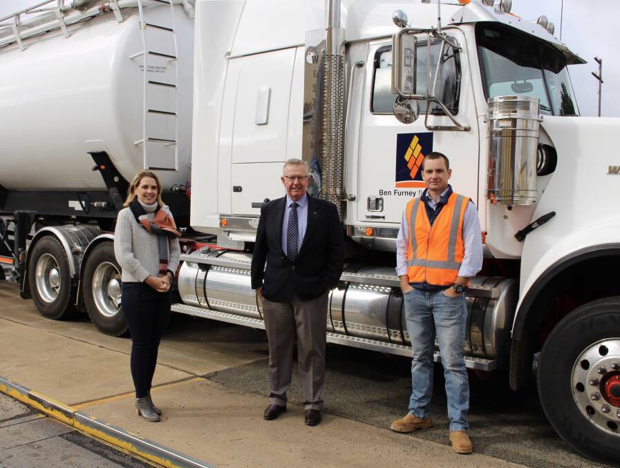 (Centre) Parkes MP Mark Coulton with Ben Furney Flour Mills leaders Sarah Furney and Tim Furney at the family-owned operation that will modernise with a $1 million grant from the federal government. Photo contributed.