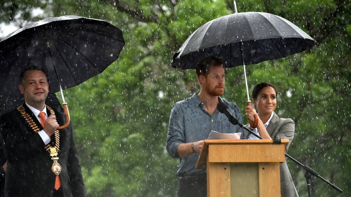 In the spotlight: Dubbo mayor Ben Shields and the Duke and Duchess of Sussex at the Picnic in the Park on October 17, watched by a global audience. The cost of the royal couple's trip to Australia has now been revealed. 