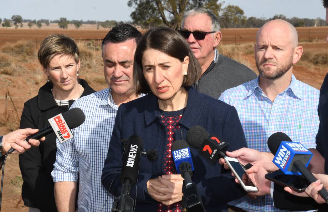 NSW Premier Gladys Berejiklian at the Cox family farm in the Coboco district last week for the announcement of a $584 million drought package, including $24.4 million to build three Doppler radars in central and far-western NSW. Photo: BELINDA SOOLE
