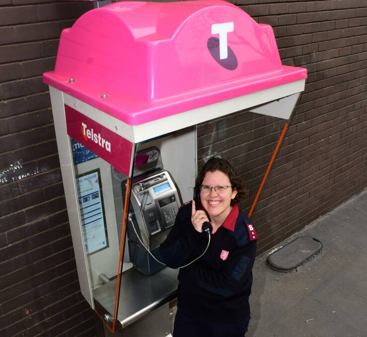 CONNECT: Dubbo's Captain Lara Sutcliffe of the Salvation Army, which has applauded Telstra's move to make payphones free for calls within Australia. Photo: BELINDA SOOLE