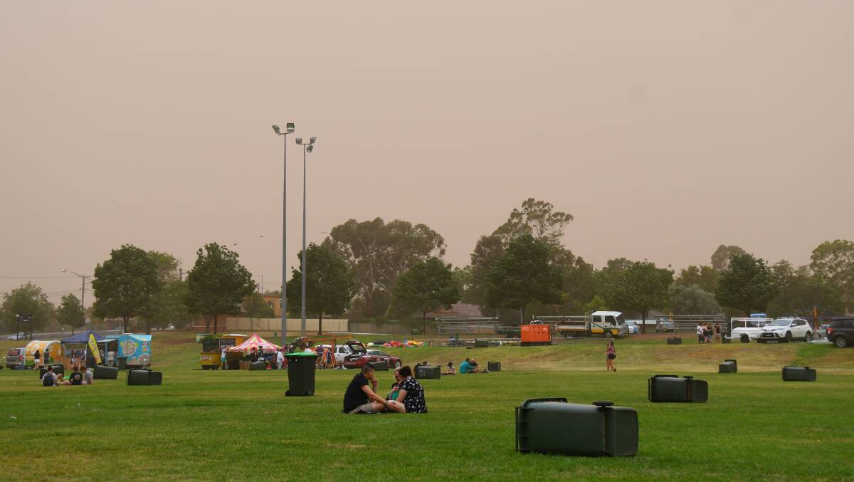 Called off: Apex Oval, the venue of the New Year's Eve fireworks, as thick dust blew in. Photo: AMY MCINTYRE