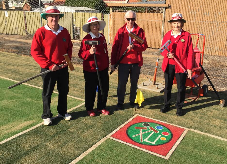 Keen: Muller Park Tennis and Croquet Club members Peter Heywood, Jenny Brown, Ben Vang and Tricia Shanks, in 2020 at the opening of the synthetic turf courts. The club's 100th birthday is in September. Photo: FAYE WHEELER