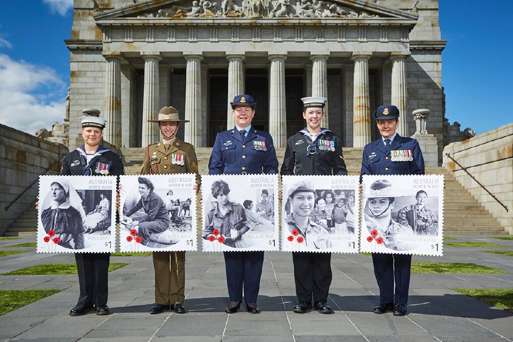 Current members of the ADF standing on the steps of Melbourne’s Shrine of Remembrance with oversized stamp replicas (L-R) Able Seaman Medical (ABMED) Lillie Heymann – Navy; Corporal (CPL) Amelia Hagger – Army; Squadron Leader
(SQNLDR) Evelyn Wright – Air Force; Leading Seaman (LS) Zoraya Tibos – Navy; Flight Lieutenant (FLTLT) Robyn Connell – Air Force. Photo contributed.