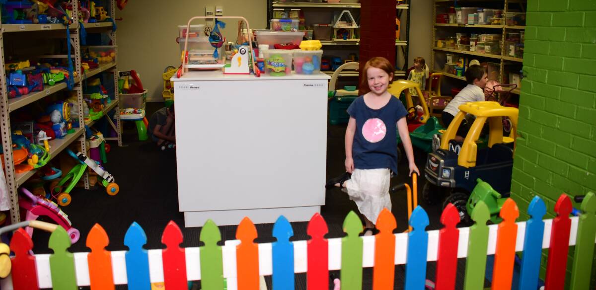 Penny Gleeson explores the Orana Toy Library collection. Photo: AMY MCINTYRE