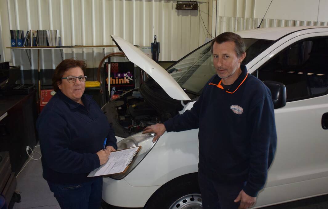Milestone: Karen and Craig Granger, owners of Macquarie Automotive at Dubbo, mark 20 years in business by working to keep their customers on the road. Photo: FAYE WHEELER