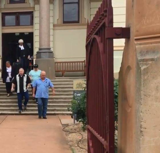 Family members of victims Stephen and Jacob Cumberland leave the Dubbo courthouse on Wednesday. 